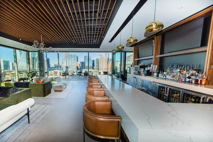Premium bar with leather seating and skyline views